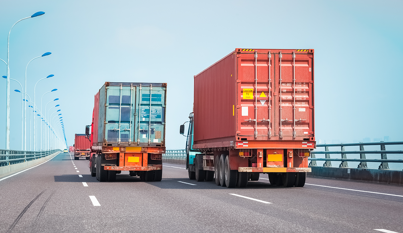 Trucks driving on road
