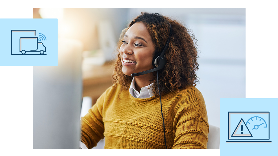 Dispatcher happily uses desktop computer, overlayed with icons representing real-time visibility.