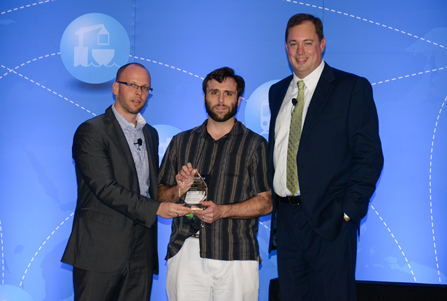 Vince Stefanos accepts his award from Ed Ryan and Scott Pagan