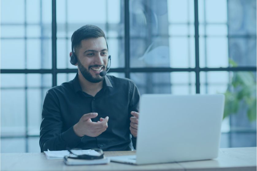 Smiling ecommerce expert wearing a headset