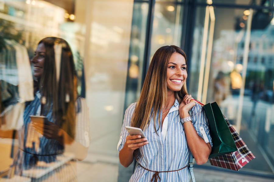 Customer uses smartphone to check in for in-store pickup