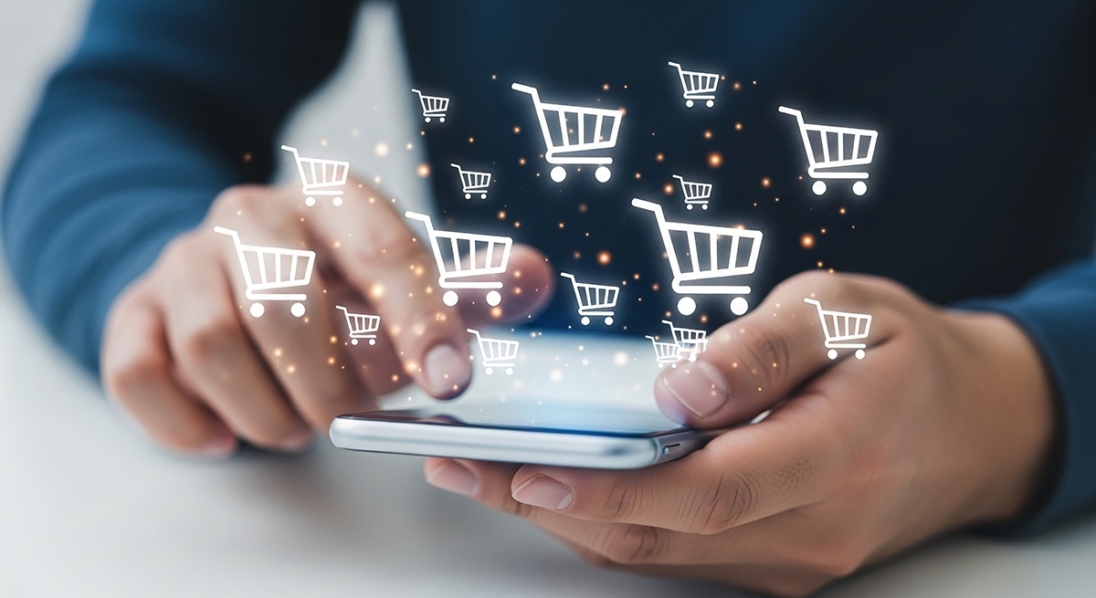 An ecommerce businessperson is using a smartphone to sell on multiple marketplaces, represented by a collection of shopping cart icons hovering above the phone screen.