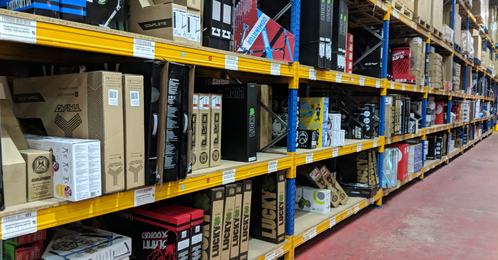 An image showing a well-stocked warehouse rack with neatly organized products.
