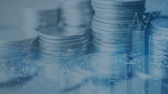 Stacks of coins with business statistics