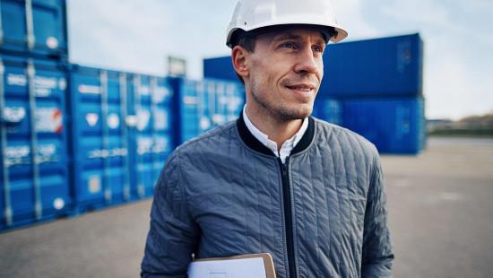 image - port worker blue containers