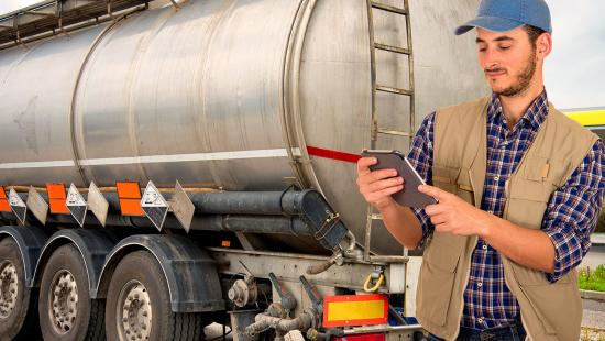 Fuel truck driver with tablet