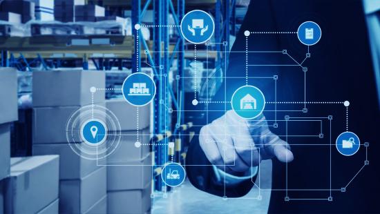Warehouse worker with finger pointing to symbols representing common ecommerce purchasing headaches