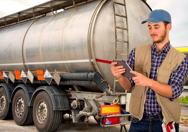Fuel truck driver with tablet