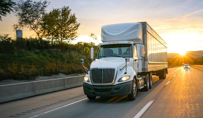 Image of a North American style truck driving down the road