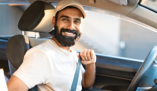 Happy beverage merchandiser uses private vehicle