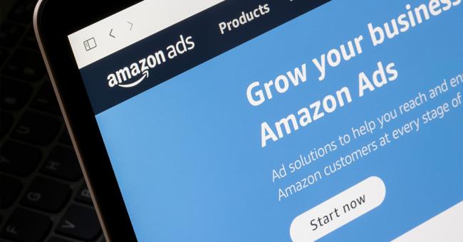 An image showing the Amazon Ads landing page on a laptop screen.