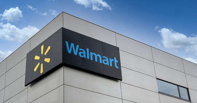 An image of an office building featuring the Walmart logo.